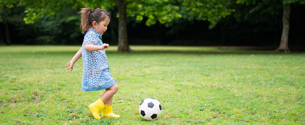 Girl playing soccer