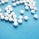 white-medication-on-blue-background